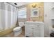 Bathroom features a shower-tub combo, white vanity, and decorative tile backsplash at 10730 52Nd N Ave, St Petersburg, FL 33708