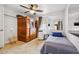 Simple bedroom featuring a sauna, twin bed, tiled flooring and a bright window at 10730 52Nd N Ave, St Petersburg, FL 33708