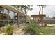 Charming patio with comfortable seating and pergola creating a serene outdoor living area at 10730 52Nd N Ave, St Petersburg, FL 33708