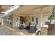 Inviting covered patio with comfortable seating area and outdoor bar, great for relaxation and entertaining at 10730 52Nd N Ave, St Petersburg, FL 33708