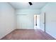 Bright bedroom with plush carpet, neutral paint, and a spacious closet for optimal storage at 11035 Sage Canyon Dr, Riverview, FL 33578