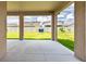 Covered patio overlooking the fenced backyard, perfect for outdoor entertaining and relaxation at 11035 Sage Canyon Dr, Riverview, FL 33578