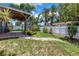 The backyard is landscaped and contains a covered patio at 11301 80Th Ave, Seminole, FL 33772