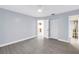 Spacious bedroom with modern flooring, neutral paint, and well-lit with an ensuite bathroom at 11301 80Th Ave, Seminole, FL 33772