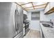 Well-equipped kitchen with stainless steel appliances, modern countertop, and ample storage space at 11301 80Th Ave, Seminole, FL 33772