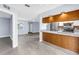 Open-concept kitchen featuring stainless steel appliances and seamless access to the living area at 11301 80Th Ave, Seminole, FL 33772