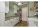 A clean and well-organized laundry room with modern washer and dryer appliances at 11430 Trotting Down Dr, Odessa, FL 33556