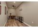 Office with desk, chair, and hardwood flooring at 11430 Trotting Down Dr, Odessa, FL 33556