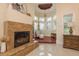 Sitting room area with bay window and fireplace at 11430 Trotting Down Dr, Odessa, FL 33556