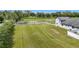 Vast backyard showcasing the home's ample space and surrounding greenery at 12637 Tyler Run Ave, Odessa, FL 33556