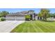 A well-maintained home with a large three car garage, freshly cut lawn and beautiful trees at 12637 Tyler Run Ave, Odessa, FL 33556