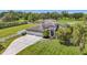 Beautiful ranch home on acreage with fenced paddock, long driveway, and outbuilding at 12637 Tyler Run Ave, Odessa, FL 33556