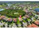Aerial view of a beautiful community with multiple ponds and lush green spaces at 13113 Green Violet Dr, Riverview, FL 33579