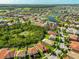 An aerial view of a sprawling residential community with lakes and lush landscaping surrounding well-maintained homes at 13113 Green Violet Dr, Riverview, FL 33579