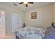 Cozy bedroom with carpeted floors, neutral paint, a ceiling fan, and a closet at 13113 Green Violet Dr, Riverview, FL 33579