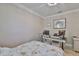 Bedroom boasts a modern desk setup with dual monitors and plenty of natural light at 13113 Green Violet Dr, Riverview, FL 33579