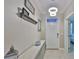 Bright foyer with a modern chandelier, a white front door, and stylish decor at 13113 Green Violet Dr, Riverview, FL 33579