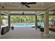 Inviting community pool area with ample seating and shaded lounging spaces at 13113 Green Violet Dr, Riverview, FL 33579