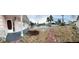 Charming home exterior featuring a well-maintained front yard with manicured landscaping at 13605 Stacey Dr, Hudson, FL 34667