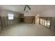 Spacious living room undergoing renovations, offering a blank canvas to create your dream space at 13605 Stacey Dr, Hudson, FL 34667