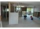 An unfinished living space reveals ongoing renovations with exposed framing, awaiting customization to the buyer's taste at 13605 Stacey Dr, Hudson, FL 34667