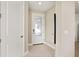 Bright entryway featuring a decorative glass front door, tile flooring, and neutral wall paint at 14317 Eagle Branch Dr, Nokomis, FL 34275