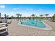 Community pool featuring a zero entry, shallow end, and plenty of lounge seating at 14317 Eagle Branch Dr, Nokomis, FL 34275