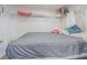 Storage space above the bed, suitable for storage and personal items at 14820 Rue De Bayonne # 301, Clearwater, FL 33762