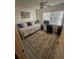 Versatile bedroom with a daybed, desk, and chair, perfect for relaxation or study at 1729 Seascape Cir # 102, Tarpon Springs, FL 34689