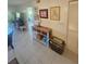Inviting entryway featuring tiled floors, console table, and decor in a well-lit space at 1729 Seascape Cir # 102, Tarpon Springs, FL 34689
