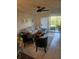 Inviting living room with plush seating, tile flooring, and a view of the outdoor scenery at 1729 Seascape Cir # 102, Tarpon Springs, FL 34689