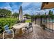 Charming patio area with comfortable seating, ideal for outdoor relaxation and dining at 1729 Seascape Cir # 102, Tarpon Springs, FL 34689