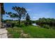 Picturesque backyard with a pond at 1729 Seascape Cir # 102, Tarpon Springs, FL 34689