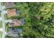 Aerial view of backyard with pool, with the home located near mature trees at 18434 Eastwyck Dr, Tampa, FL 33647