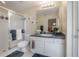 Updated bathroom with a glass-enclosed shower, modern vanity, and a clean, stylish design at 18434 Eastwyck Dr, Tampa, FL 33647