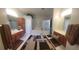 En-suite bathroom featuring double vanities, walk-in closet, and a tub at 18434 Eastwyck Dr, Tampa, FL 33647