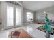 Bright foyer with decorative glass doors, neutral walls, and a stylish modern interior at 18434 Eastwyck Dr, Tampa, FL 33647