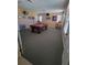 Spacious game room featuring a pool table, unique lighting, and a dart board at 18434 Eastwyck Dr, Tampa, FL 33647
