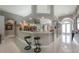Modern kitchen featuring an island and an open layout with bar seating, perfect for entertaining at 18434 Eastwyck Dr, Tampa, FL 33647