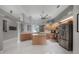 Spacious kitchen with stainless steel appliances, island, and ample countertop space at 18434 Eastwyck Dr, Tampa, FL 33647