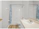Bathroom features a shower-tub combination and modern sink at 18809 Duquesne Dr, Tampa, FL 33647