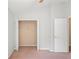 Open closet in this bedroom, complemented by a door to another room at 18809 Duquesne Dr, Tampa, FL 33647