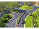 Gated community entrance with lush landscaping and black iron fencing at 18809 Duquesne Dr, Tampa, FL 33647