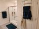 Bright bathroom featuring a glass enclosed shower and towel racks for added convenience at 1905 Blue Stream St, Ruskin, FL 33570