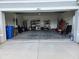 Open garage showcasing storage; ample space for vehicles and projects at 1905 Blue Stream St, Ruskin, FL 33570