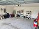 Spacious garage with ample storage space and a clean, unfinished ceiling at 1905 Blue Stream St, Ruskin, FL 33570