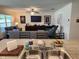 Kitchen view showcases stainless steel sink and countertop overlooking the living room at 1905 Blue Stream St, Ruskin, FL 33570