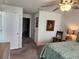 Bedroom features a comfortable bed and art at 1905 Blue Stream St, Ruskin, FL 33570