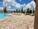 Inviting community pool with lounge chairs for relaxing and soaking up the sun at 1905 Blue Stream St, Ruskin, FL 33570