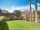 The fully fenced backyard is well-maintained, offering a private outdoor space for activities and relaxation at 1906 White Cedar Way, Brandon, FL 33511